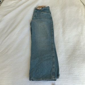 reformation cowboy jeans